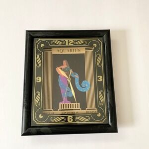 Vintage Aquarius Wall Clock Black and Gold with Multicolor Figure